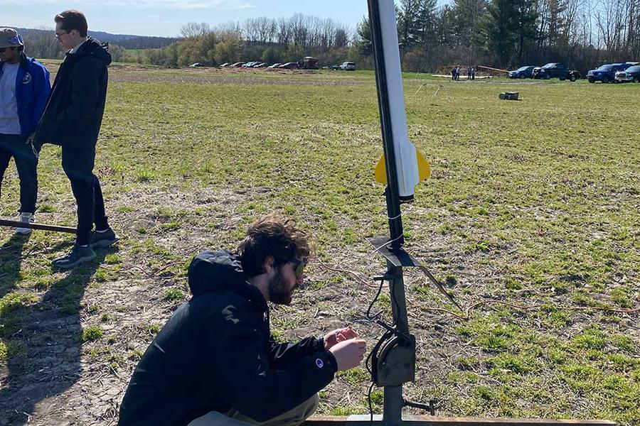 Student working on a rocket